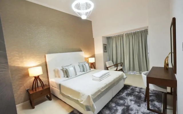 Отель Key One Homes - Cayan Tower комната для гостей