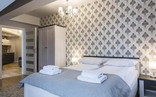 Апартаменты Msc Apartments Krupówki Park Centrum Закопане комната для гостей
