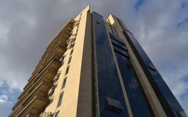 Отель Penthouse in Republic Square вид на фасад