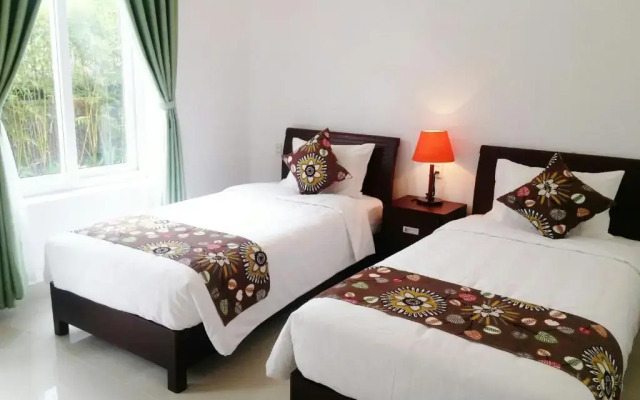 Отель Flora Hoian Villa комната для гостей