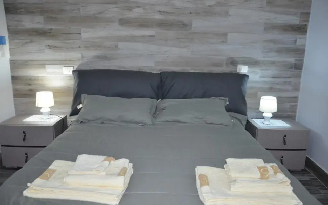Отель Holiday House in Ortigia Сиракуза комната для гостей