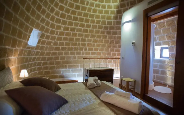 Отель Grandi Trulli Bed & Breakfast Альберобелло комната для гостей