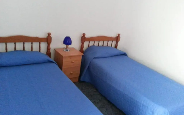 Отель Pozo Izquierdo Homelidays комната для гостей