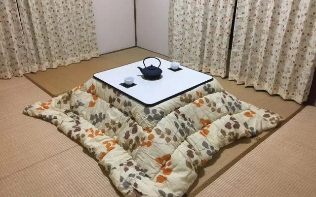 Отель Tokyo Kamakura House комната для гостей