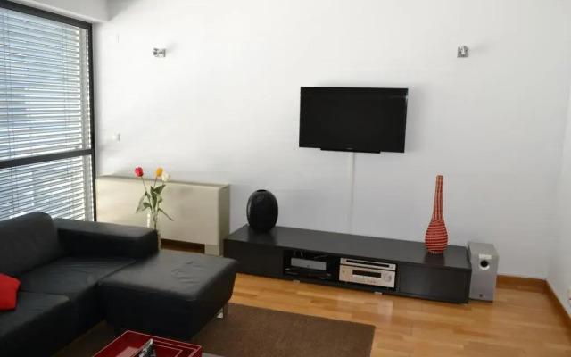 Апартаменты Expo Apartment комната для гостей