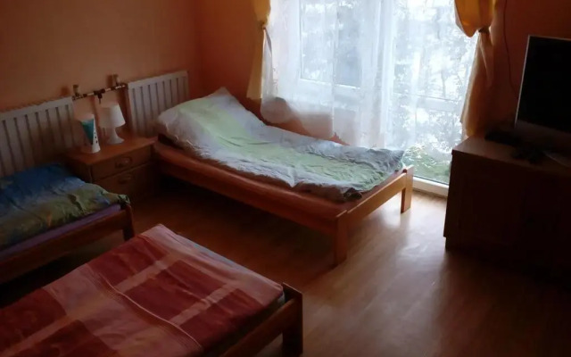 Отель Pokoje Gościnne Pod Wiatrakiem Польша, Кекж - отзывы, цены и фото номеров - забронировать отель Pokoje Gościnne Pod Wiatrakiem онлайн комната для гостей