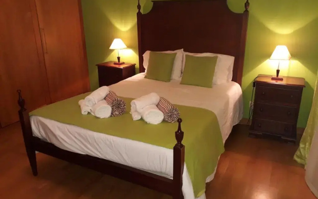 Отель Apartamento Oceanus by Green Vacations Португалия, Понта-Делгада - отзывы, цены и фото номеров - забронировать отель Apartamento Oceanus by Green Vacations онлайн комната для гостей