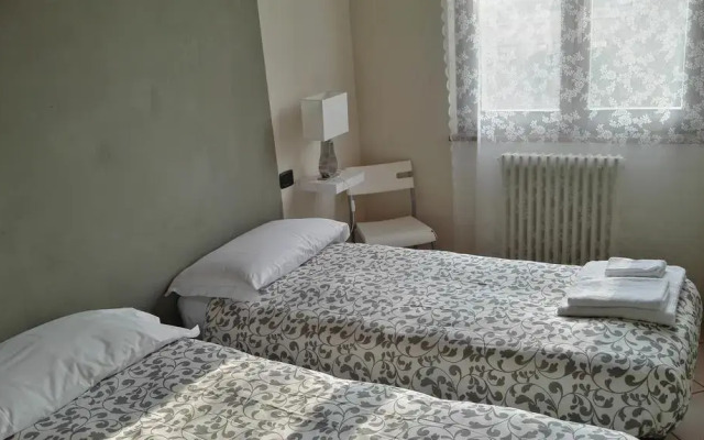 Отель Appartamento Luisa Парма комната для гостей