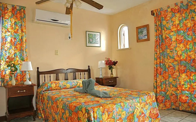 Отель Carib Beach Apartments, Negril Ямайка, Вестморленд - отзывы, цены и фото номеров - забронировать отель Carib Beach Apartments, Negril онлайн комната для гостей
