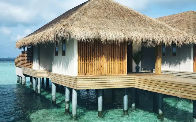 Отель Kudafushi Resort and Spa