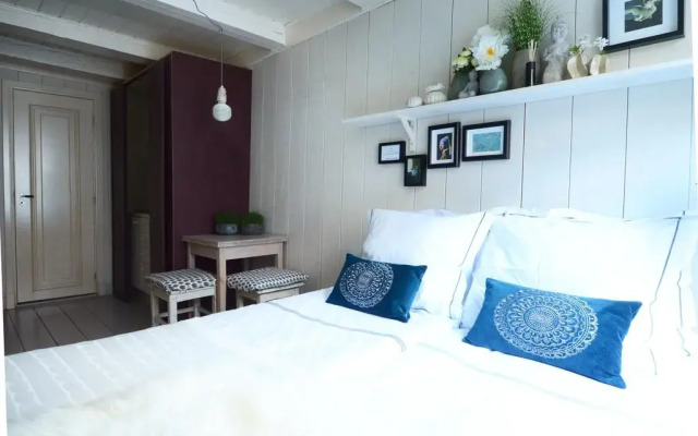 Апартаменты Dahli's Boutique Apartments комната для гостей