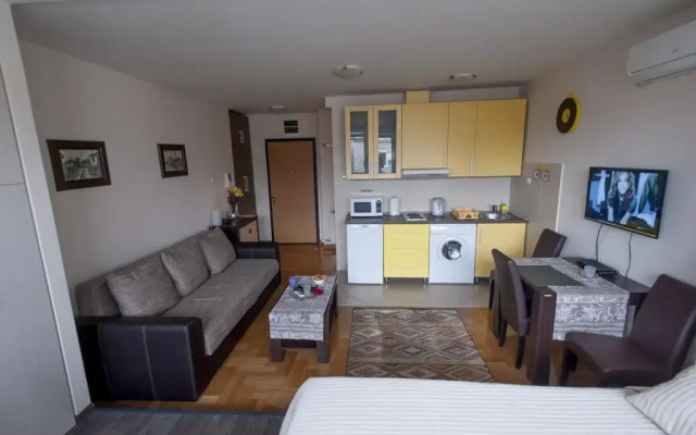 Апартаменты Mige Apartment комната для гостей