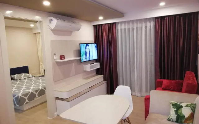 Отель Lovely Condo Паттайя комната для гостей