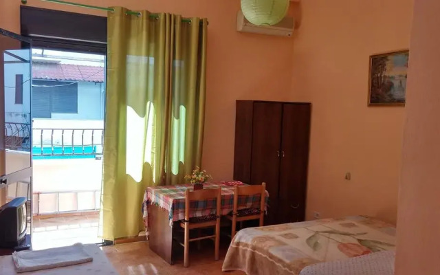 Апартаменты Troy Apartments Дуррес комната для гостей