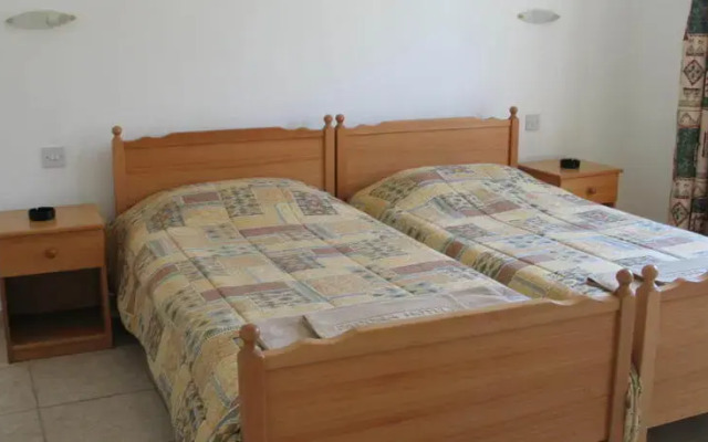 Апартаменты Pagona Holiday Apartments комната для гостей