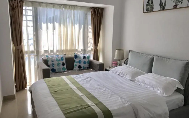 Апартаменты Shenzhen Wozhan Apartment K K Mall комната для гостей
