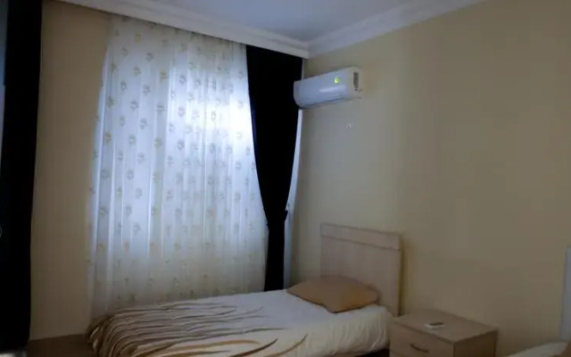 Отель Holiday Houses Antalya Анталья комната для гостей