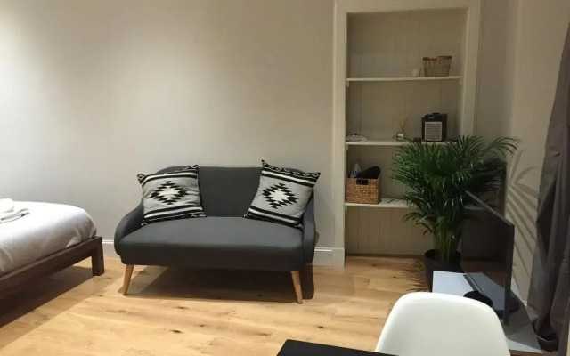 Апартаменты Royal Mile Studio Эдинбург комната для гостей