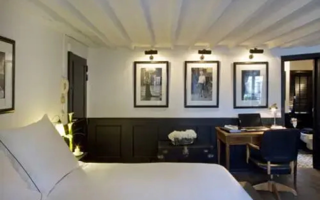 Отель Les Suites Parisiennes Франция, Париж - отзывы, цены и фото номеров - забронировать отель Les Suites Parisiennes онлайн интерьер отеля