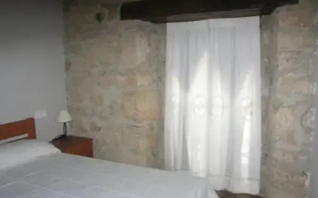 Отель Apartamentos Puente Viesgo комната для гостей