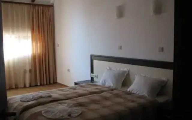 Апартаменты Kosara Apartments Банско комната для гостей