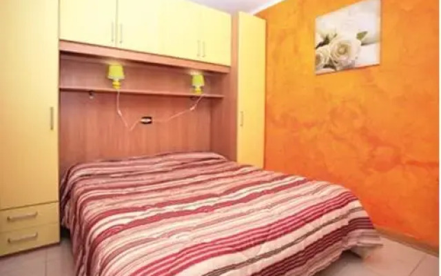 Отель Appartamenti Agenzia Sabina Lignano комната для гостей