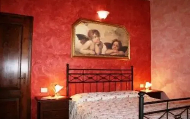 Отель Agriturismo Poggio al Vento Синалунга комната для гостей