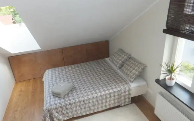 Отель City Center Penthouse Таллин комната для гостей