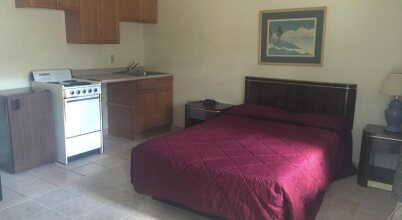 Red Carpet Inn Suites New Mil, фото 11