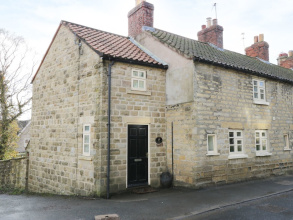 Ann's Cottage And The Old Smithy