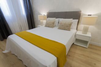 Dobo Rooms - Relatores III Apartment, фото 7