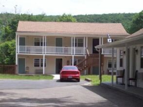 Red Carpet Inn Suites New Mil, фото 14