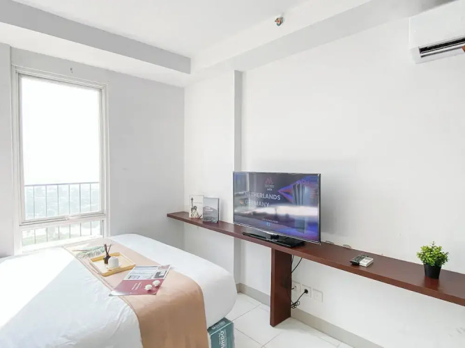 Basic Studio Room At Azalea Suites Apartment — фото 4